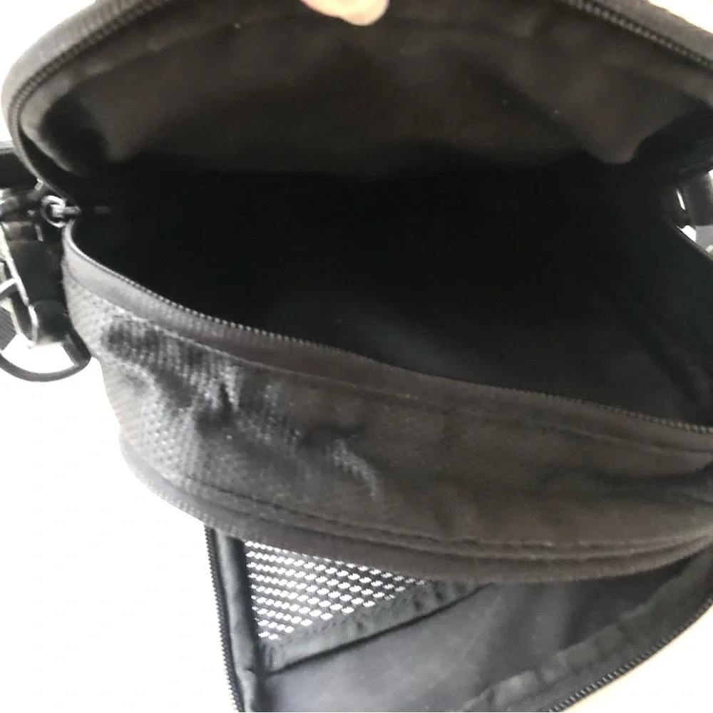 TUMI Leather & Canvas Unisex Shoulder Bag, Gently Used.